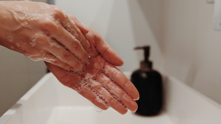 Contamination-OCD-Comprehensive-Insights-and-5-Strategies-for-Better-Management Scrubbing and washing hands in sink | Contamination OCD Comprehensive Insights and 5 Strategies for Better Management | Mindful Health Solutions