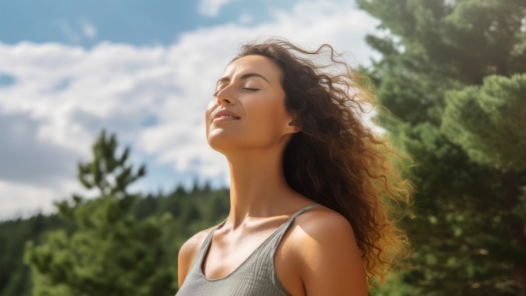 Mindfulness-Techniques-for-Bipolar-Disorder-Do-They-Actually-Help Relaxed caucasian woman breathing fresh air in a green forest. | Mindfulness Techniques for Bipolar Disorder Do They Actually Help | Mindful Health Solutions
