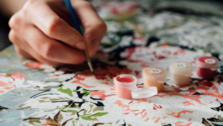 Find-Your-Escape-10-Creative-Outlets-for-Easing-Depression Hand painting a paint by numbers canvas | Find Your Escape 10 Creative Outlets for Easing Depression | Mindful Health Solutions