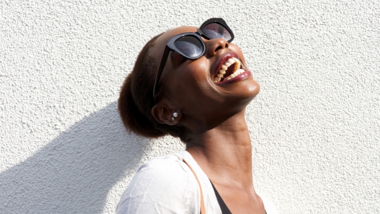 Want Positive Mental Health The Powerful Role of Self-Esteem Woman laughing | Want Positive Mental Health The Powerful Role of Self-Esteem | Mindful Health Solutions