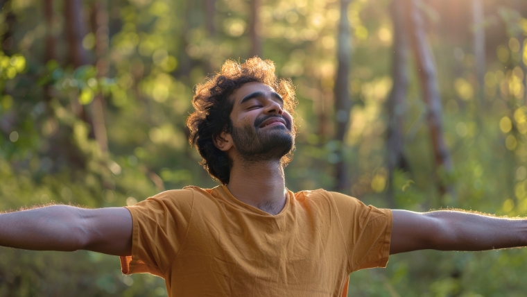 Tried Everything Else for Depression Discover How TMS Can Help A man standing outside with his arms out and face pointing up with a look of relief and joy | Tried Everything Else for Depression Discover How TMS Can Help | Mindful Health Solutions